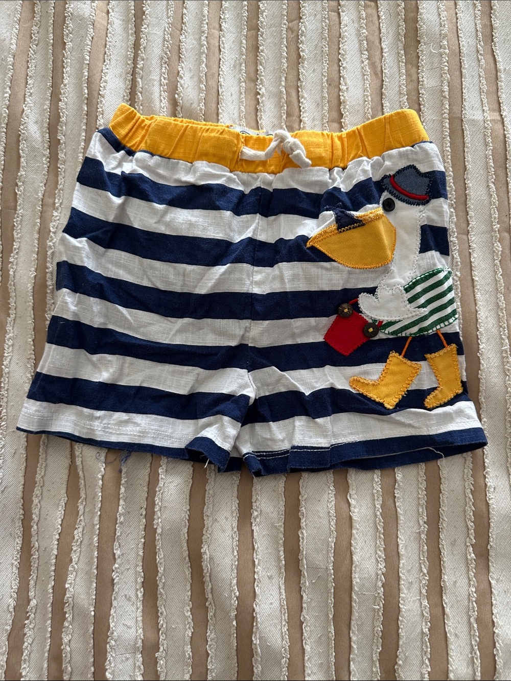 Mud Pie Navy, White & Yellow Striped Swim Trunks with Duck Appliqué